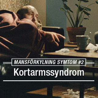 A square campaign graphic showing a miserable-looking bald man bundled up tightly in a brown blanket on a couch, reaching out weakly toward a coffee mug on a coffee table strewn with tissues. A white graphic overlay reads 'MANSFÖRKYLNING SYMTOM #2' and 'Kortarmssyndrom' (Short arm syndrome).